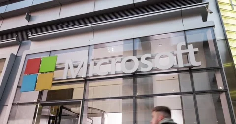 Microsoft logo and sign above store entrance in NYC. Microsoft shop Stock Footage 219407774