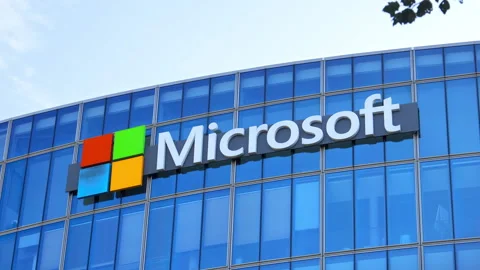 Microsoft logo on the headquarters building in Issy-les-Moulineaux, France Stock Footage 256767970