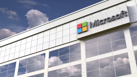 Microsoft logo on top of a modern building. Editorial conceptual 3d rendering 스톡 일러스트