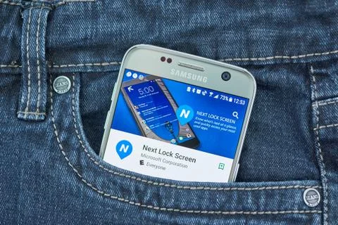 Microsoft Next Lock Screen mobile application on screen of Samsung Stock Photos