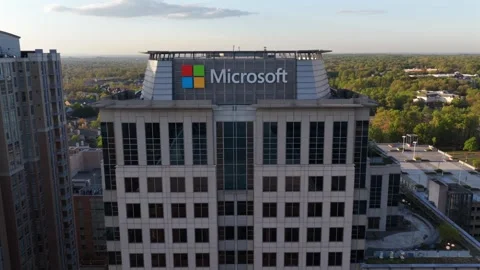 Microsoft office tower in Reston, Virginia, USA at sunset with corporate logo Video stock 334119409