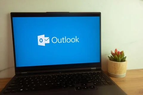 Microsoft Outlook program logo displayed on laptop Stock Photos