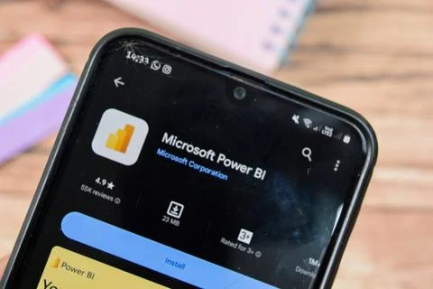 Microsoft Power BI application on Smartphone screen. Power BI is a freeware Stock Photos
