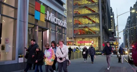 Microsoft Store in New York City. Illuminated Microsoft sign above shop entrance Stock Footage 219874616