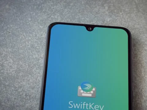 Microsoft SwiftKey Keyboard app launch screen with logo on the display of a b Foto stock
