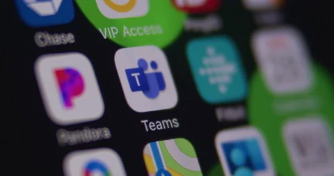 Microsoft TEAMS App on Smartphone. Macro. Selecting and opening App Stock Footage 149545977