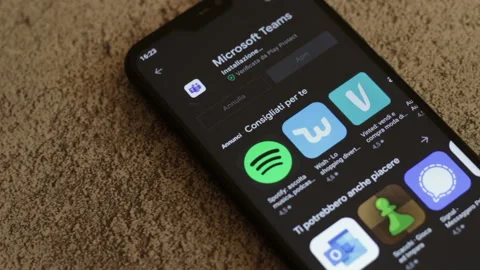 Microsoft Teams business application in Google play store on smartphone screen. Stock-Footage 147350618