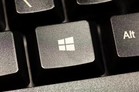 Microsoft Windows 10 operating system logo key on a black computer keyboard Stock Photos