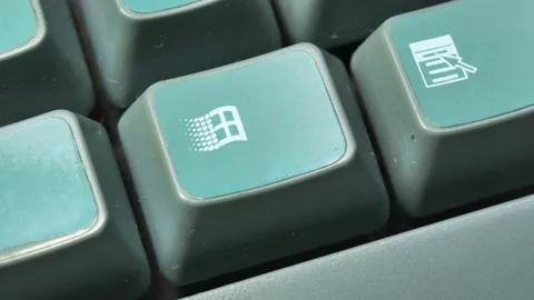 Microsoft Windows 95 98 2000 logo symbol icon, OS key on an old retro  keyboard