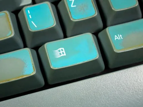 Microsoft Windows 95 98 2000 logo symbol icon OS key on an old retro keyboard Stock Photos