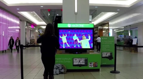 Microsoft xbox demonstrates dance game Stock Footage 47497397