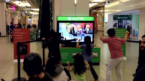 Microsoft xbox demonstrates dance game Stock Footage 48276719