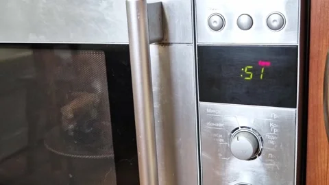 Microwave Oven Digital Timer Counting Down Seconds Stock Footage 323524656