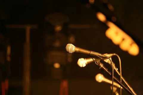 Mics on stage Stock Photos
