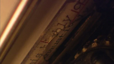 Mid 20th Century typewriter in close up, click-clacking away on keys Stock Footage 91144627