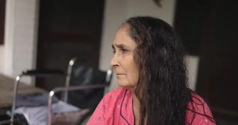 Mid-60s Elderly Woman In Deep Thought. Stock Footage 248613730