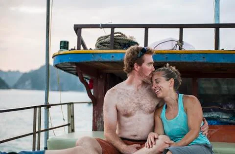 Mid adult couple relaxing on a boat in Halong Bay in Vietnam Stock Photos