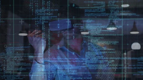 Mid adult male developer activating VR headset at desk, swiping and pinching Stock Footage 314687257