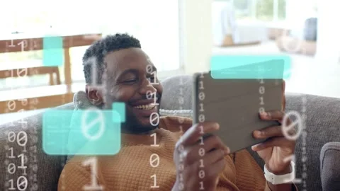 Mid-adult man tapping tablet causing binary teal blocks covering tablet and Stock Footage 333894526