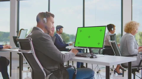 Mid adult man working on computer Video stock 164667751