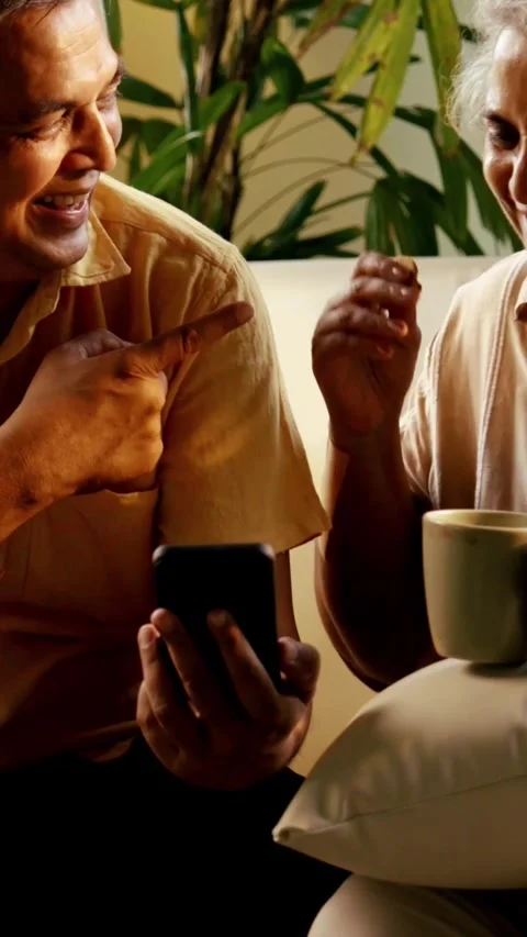 Mid age Indian couple spending peaceful time together at home Stock-Footage 343360898