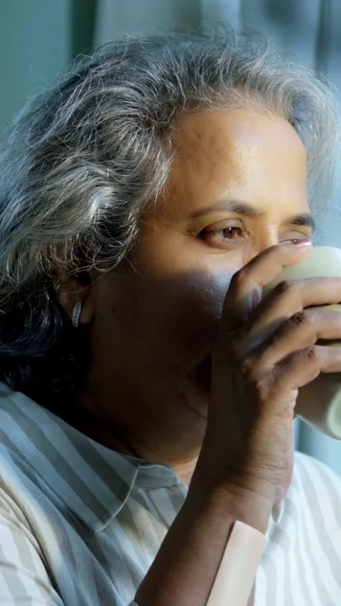 Mid age Indian couple spending peaceful time together at home Stock Footage 343361089