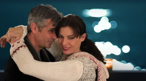 Mid aged couple dancing in moonlight Stock Footage 43676498