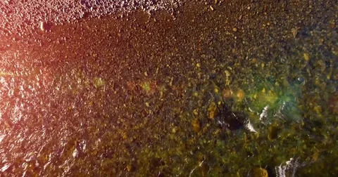 Mid air flight over fresh and clean mountain river at sunny summer morning Stock Footage