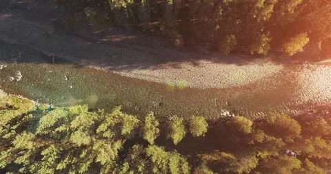 Mid air flight over fresh and clean mountain river at sunny summer morning Stock Footage 115078246