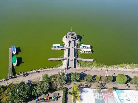Mid altitude drone view from malecon towards pier in Cajititlan Jalisco Mexico Stock Photos