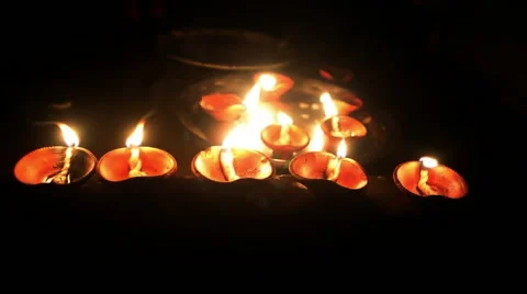 Mid close shot of earthen lighted lamps in Deepawali.India. Stock-Footage 43098276