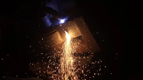 Mid close up shot of men grinding a casting part in warehouse. Industrial 스톡 동영상 296808474