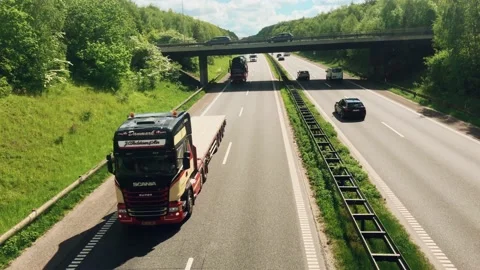 Mid day traffic on the E20 highway that connect Jutland and Zealand Stock Footage 155123495