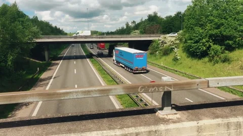 Mid day traffic on the E20 highway that connect Jutland and Zealand Stock Footage 155123599