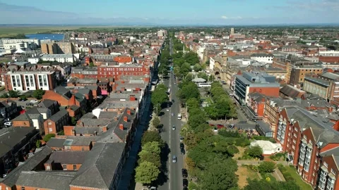 Mid-level aerial fly along clip of the South section of Lord Street Stock Footage 244814619