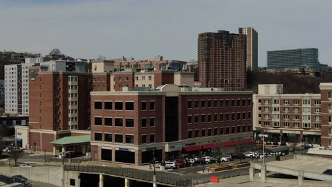 Mid-rise brick housing and storefronts in Edgewater New Jersey Stock-Footage 105686951