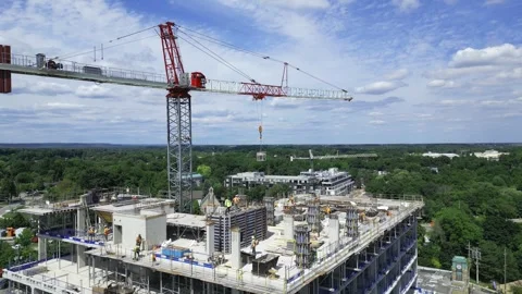 Mid-Rise Concrete Building Under Construction with Tower Crane 스톡 동영상 337244283