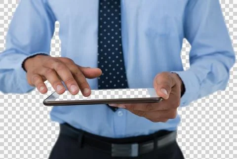 Mid section of businessman touching tablet computer Fotos de archivo