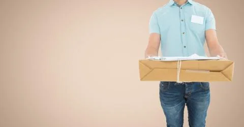 Mid section of delivery man holding parcel box Stockfoto's