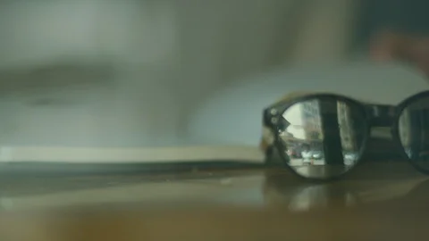 Mid-section of man flipping pages of book Stock Footage 107028383