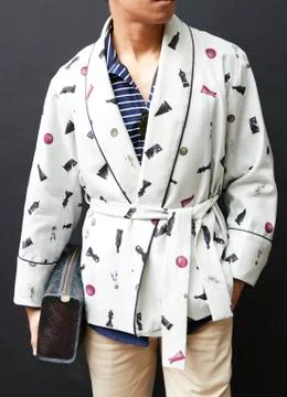 Mid section of man in short dressing gown holding sponge bag Stock Photos