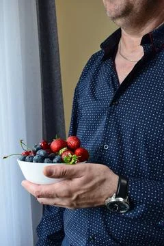 Mid section of man in stylish patterned shirt and elegant Stock Photos