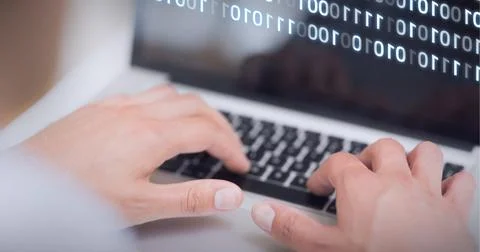 Mid section of person using laptop while binary coding data processing on screen Stock Photos