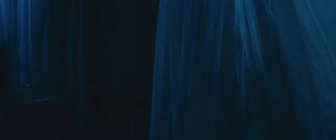 Mid-shot for empty room with a flying curtain and candle Stock Footage 213106694