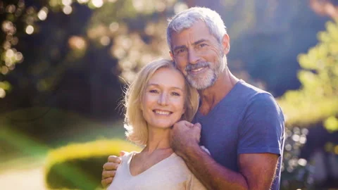 Mid-shot front view of cheerful group of coworkers reviewing details of Stock Footage 278018318