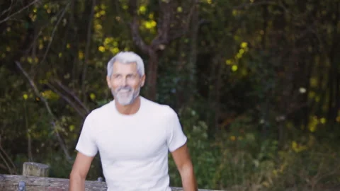 Mid-shot front view of cheerful group of coworkers reviewing details of Stock Footage 278019397