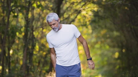Mid-shot front view of cheerful group of coworkers reviewing details of Stock Footage 278019513
