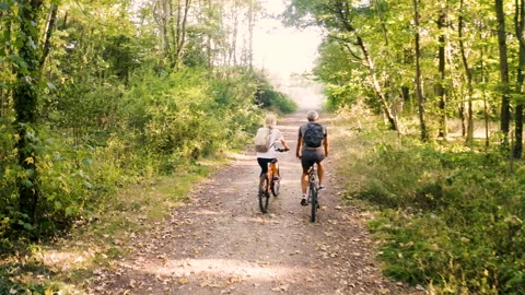 Mid-shot front view of cheerful group of coworkers reviewing details of Stock Footage 278019824