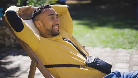 Mid-shot front view of cheerful group of coworkers going over details of new Stock Footage 278020508