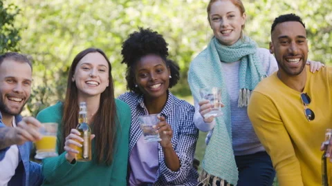 Mid-shot front view of cheerful group of coworkers going over details of new Stock Footage 278020842
